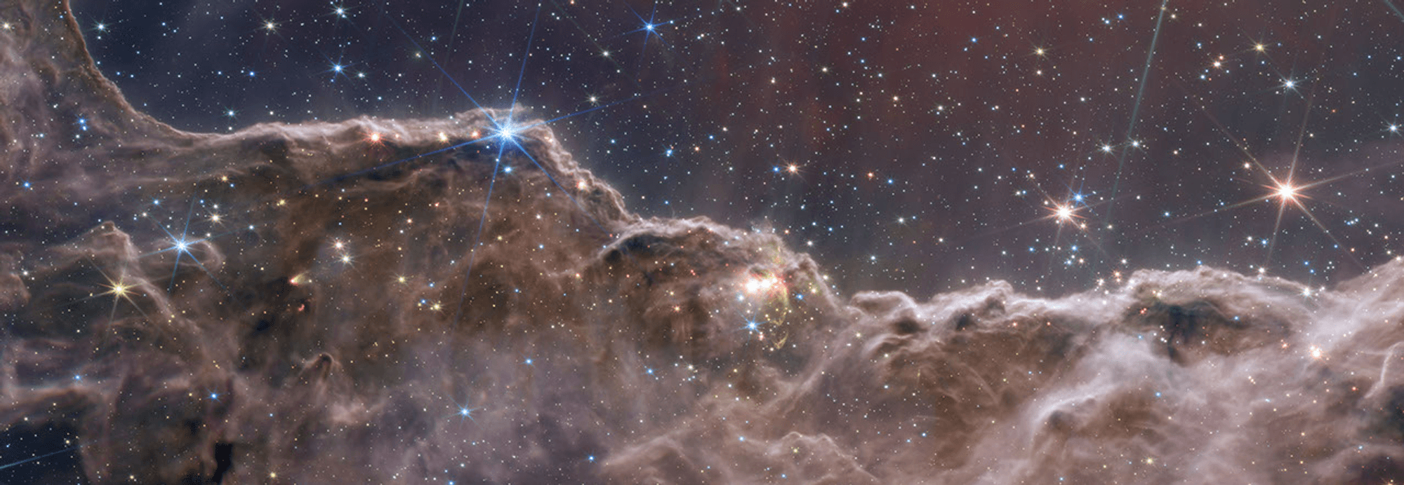 Webb view of the Cosmic Cliffs, a star-forming region in the Carina Nebula